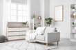 © Pixel-Shot - Interior of light living room with grey sofa, shelf units and commode