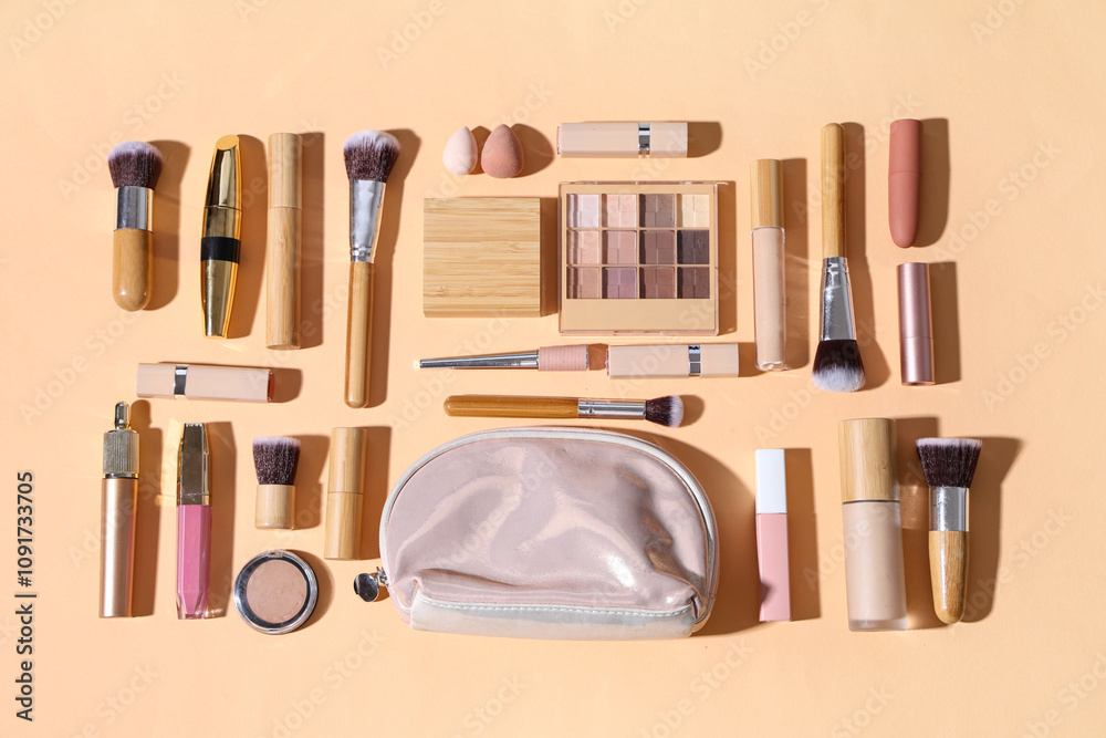 Cosmetic bag with different makeup products on beige background