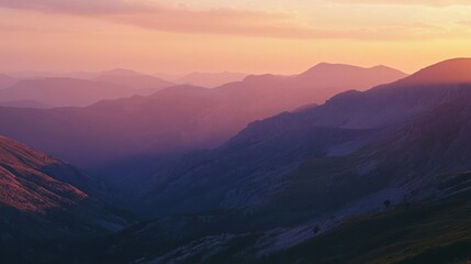 Poster - The sun sets behind a vast mountain range, casting soft pink and orange tones across the sky and illuminating the rugged terrain below. Generative AI
