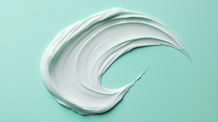 Poster - Elegant Swirl of Soft Mint Green Paint on a Serene Aqua Background Creating a Flowing, Artistic Texture Ideal for Creative Projects and Design Inspiration