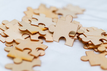 Poster - Puzzle pieces of business strategy office space visual content collaborative environment close-up view problem-solving concept
