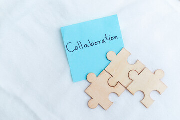 Fototapete - Collaboration in business puzzle piece concept office space visual representation creative environment close-up view teamwork insights