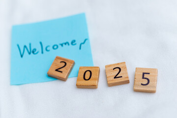 Poster - Welcome 2025 new business beginnings office space inspirational messages professional environment close-up view future planning