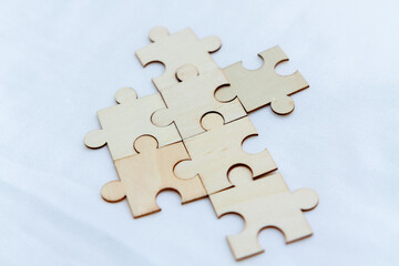 Fototapete - Strategic business planning office workspace puzzle pieces collaborative environment close-up problem-solving concept