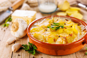 Canvas Print - baked potato with cream and cheese- homemade potato gratin