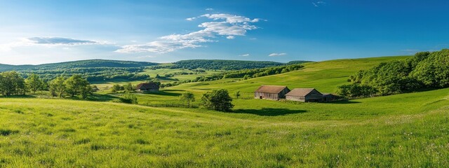 Poster - A serene landscape featuring rolling hills, green fields, and rustic barns under a blue sky.