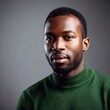 © LIGHTFIELD STUDIOS - Extreme macro portrait of an African man in a modern setting, captured with soft focus to create a smooth, dreamlike quality. The portrait highlights the contrast between his contemporary outfit and t