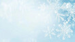 © Alex Alex - Snowflakes on a light blue background, creating a winter and festive mood. The background is soft, with the effect of shine and radiance.