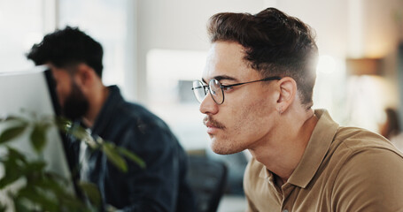 Fototapete - Computer, system maintenance and web development with man in creative workplace for coding or design. Cybersecurity, infrastructure and programming with employee person in office as website developer