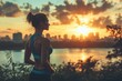 © Gatherina - Sportswoman admiring sunset over the city after training session
