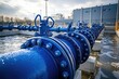 © Lubos Chlubny - Large blue water pipes supplying a modern water treatment plant