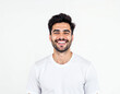 © Metehan - portrait of a young man with a bright smile against a clean white background