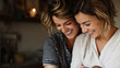 © SJ Studio - Two smiling women lovingly cradle a newborn, showcasing joy and connection in a warm, intimate setting.