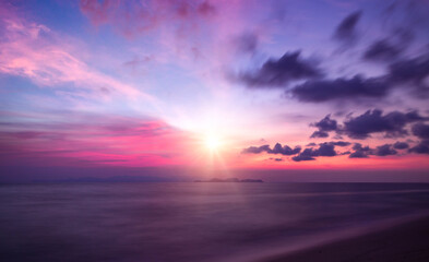Wall Mural - ature beautiful light sunset or sunrise over sea