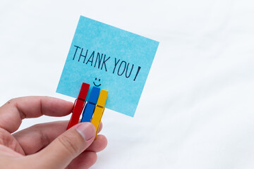 Fototapete - Thank you note handheld gesture home office social media content indoor close-up shot business appreciation concept