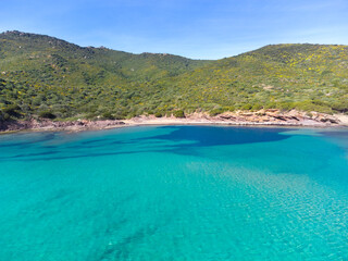 Wall Mural - Turquoise water and green hills in Sardinia