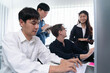 © InfiniteFlow - Group of diverse office worker employee working together on strategic business marketing planning in corporate office room. Positive teamwork in business workplace concept. Prudent