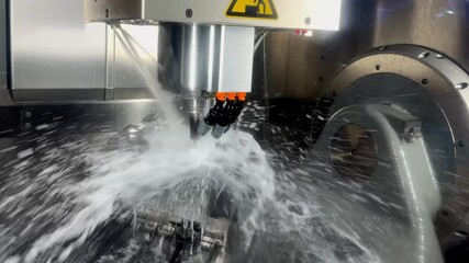 Wall Mural - cnc milling machine cutting the mold parts with oil coolant method the mold and die manufacturing pr