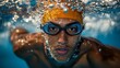 © budi - Swimmer Underwater Wearing Goggles And Cap