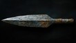 © VRVisionary - Ancient quartzite spearhead from the Atherian lithic industry showcasing primitive craftsmanship from the Paleolithic and Acheulean eras on a dark backdrop.