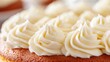 © VRVisionary - Close-up view of a moist yellow cake adorned with swirls of rich, creamy frosting showcasing a delightful and inviting texture.