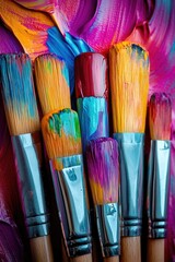 Poster - A close-up shot of a variety of paint brushes on a table