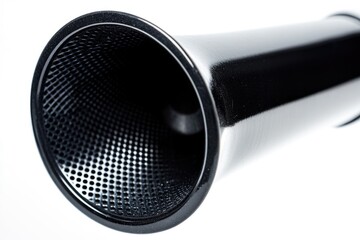 Poster - A close-up view of a black speaker on a white background, ideal for use in product photography or electronic media promotion