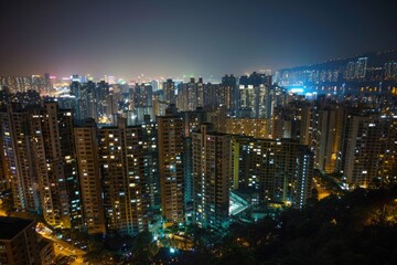 Aufkleber - Panoramic view of a city at night from a high-rise building, ideal for use in urban themed projects