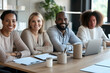 © OneLoveOnePhoto - Group of people meeting in the office
