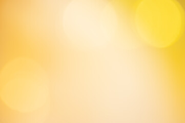 Wall Mural - bright yellow abstract background with smooth gradient and soft bokeh effects