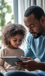 © goami - father with kid together using digital tablet for study, doing homework and browsing internet