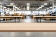 © A2Z AI  - Blurred background of a co-working space with a focus on a wooden table, emphasising it’s natural texture and creating a warm, collaborative work environment