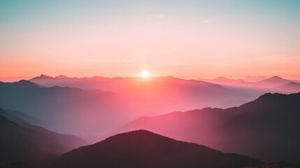 Poster - Silhouetted Mountain Range at Sunset with a Pink and Orange Sky