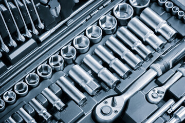 Aufkleber - A toolbox with many tools including a wrench. The wrench is silver and has a black handle
