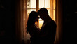 © Iuliia - Romantic couple embracing in warm window light