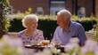 © phattharabodin - Joyful Seniors Enjoying Afternoon Tea in Garden