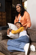 © Wavebreak Media - Grandmother comforting sleeping asian female teenager on couch at home, sharing quiet moment