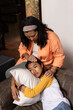 © Wavebreak Media - Grandmother comforting asian female teenager on couch, sharing warm moment at home