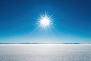 vast white landscape under a bright sun with clear blue skies