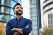 © Endri - Confident Indian Businessman in Modern City Envisioning Future Success and Leadership Goals