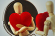 © calypso77 - Wooden mannequin with heart looking at himself in the mirror - Love yourself concept