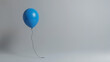 © Andrey - Single blue balloon in a minimalist setting