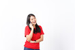 © Sino Images Studio - beautiful Asian woman poses while talking on a smartphone, exuding charm against a clean white background