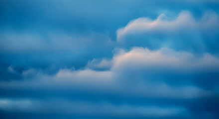 Fototapete - smooth blue cloud pattern in the form of a abstract against a background of a cloudy sky . Ideal for mature or playful designs