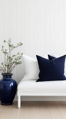 Poster - Chic living room features an indigo and white striped wallpaper, an elegant sofa with pillows, and a decorative jar, creating a stylish ambiance