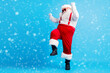 © deagreez - Full length photo of cool hipster fat santa claus dance x-mas christmas tradition discotheque wear suspenders overall sunglass boots isolated over blue color background