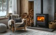 © AdibaZR - Cozy living room with fireplace and armchair by the window in winter.