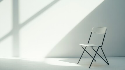 Poster - Minimalistic Chair in a Bright Room with Soft Shadows Casting on the Wall, Creating an Elegant and Serene Ambiance for Contemporary Design Spaces