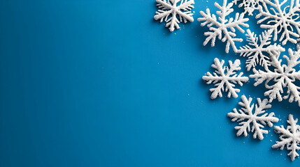 Sticker - A collection of white snowflakes scattered on a bright blue background, evoking a wintery and festive atmosphere.