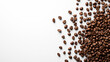 © Tatiana - Photo of coffee beans scattered on the right, on a white background, with high resolution